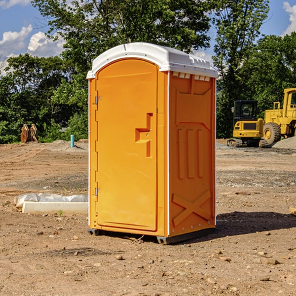 how often are the portable restrooms cleaned and serviced during a rental period in Atlantic Mine Michigan